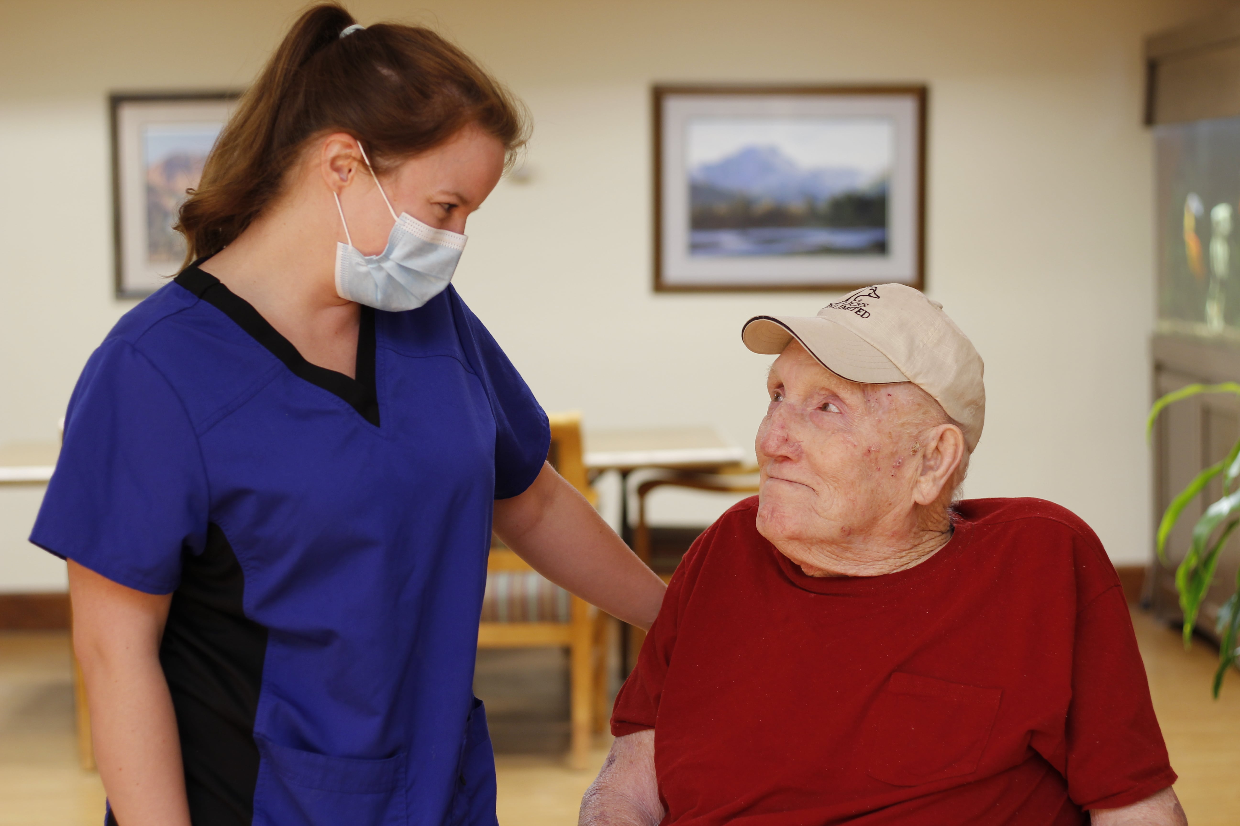 care takers putting on pillow cases